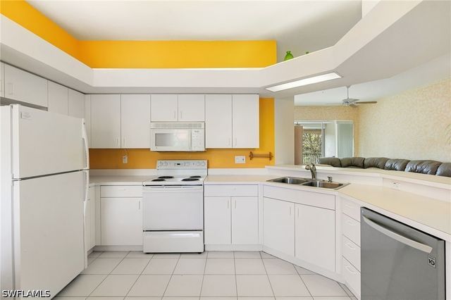 6927 Satinleaf RD N 203, Naples, FL 34109