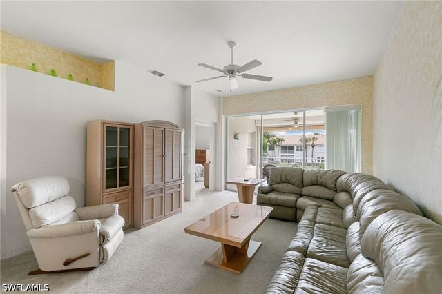 6927 Satinleaf RD N 203, Naples, FL 34109