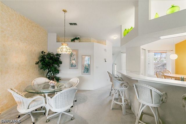 6927 Satinleaf RD N 203, Naples, FL 34109