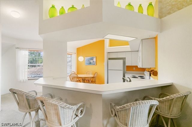 6927 Satinleaf RD N 203, Naples, FL 34109