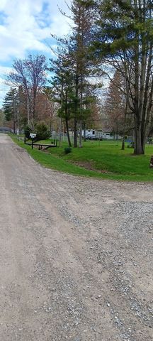 836 Poquonnock Drive, Hope, MI 48628