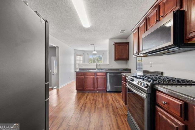 1027 WINDING WOODS Trail, Conyers, GA 30012