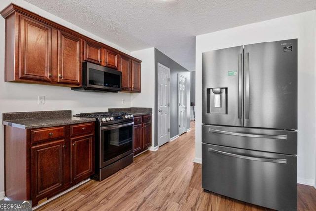 1027 WINDING WOODS Trail, Conyers, GA 30012