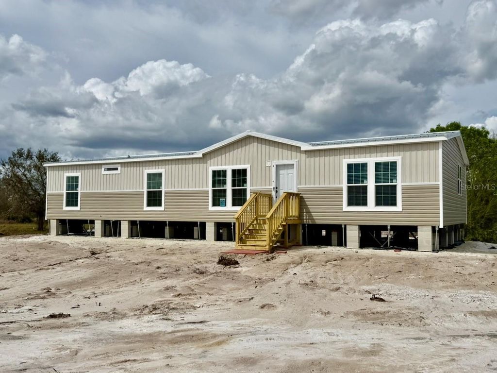 Image 1 of property listing at 15033 NW 264TH STREET, Okeechobee, FL 34972