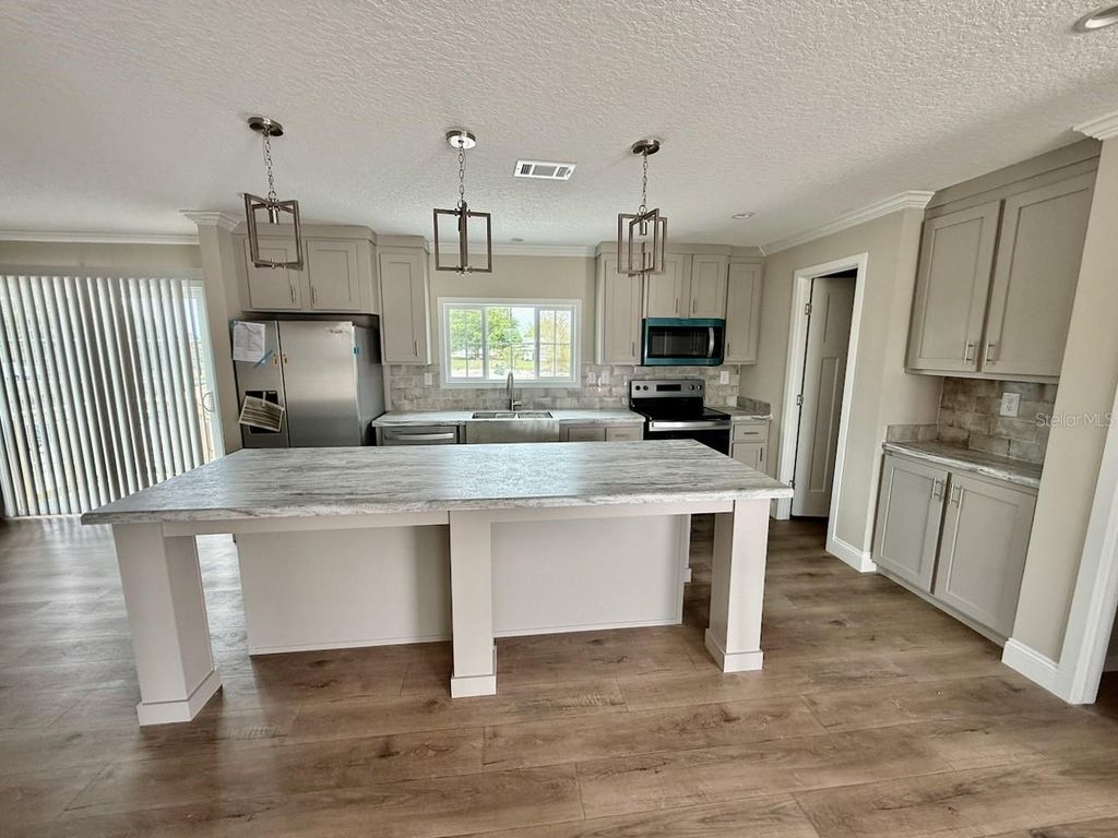 Image 17 of property listing at 15033 NW 264TH STREET, Okeechobee, FL 34972