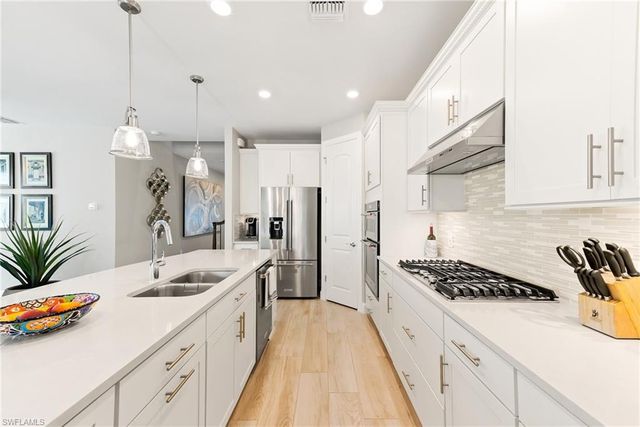 7763 Winding Cypress DR, Naples, FL 34114