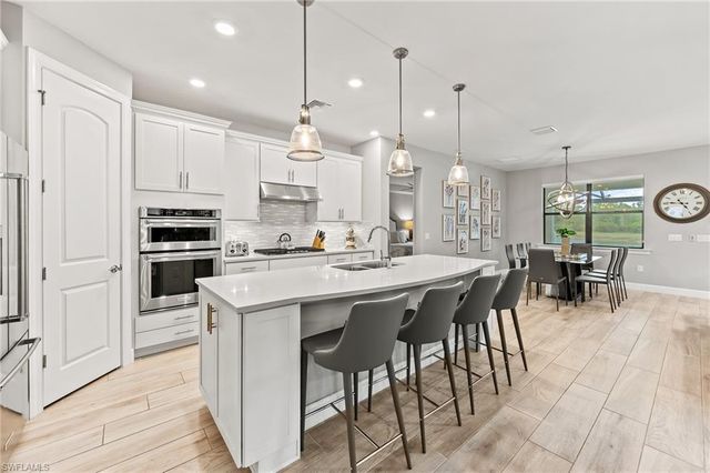 7763 Winding Cypress DR, Naples, FL 34114