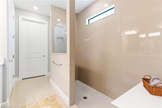 7763 Winding Cypress DR, Naples, FL 34114