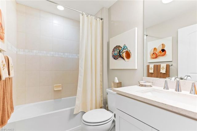 7763 Winding Cypress DR, Naples, FL 34114