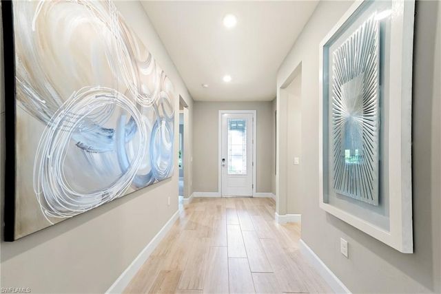 7763 Winding Cypress DR, Naples, FL 34114