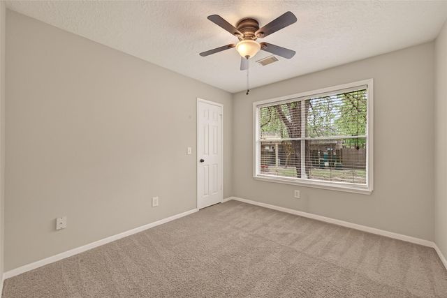 27 Lush Meadow Place, The Woodlands, TX 77381