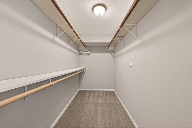 27 Lush Meadow Place, The Woodlands, TX 77381