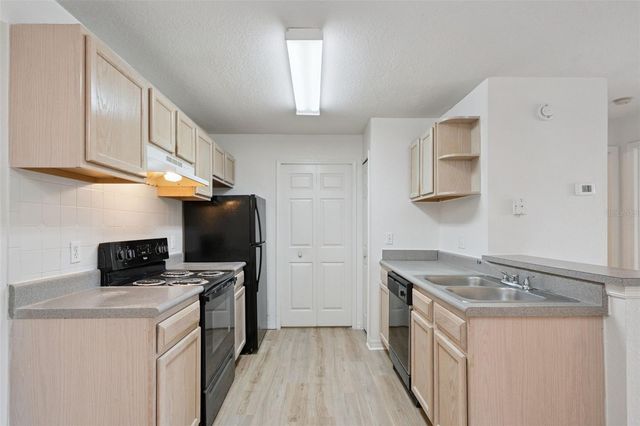 8813 LATREC AVENUE 206, Orlando, FL 32819