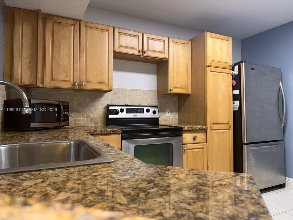 8901 Wiles Rd 103, Coral Springs, FL 33067