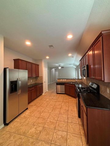 1707 Hickory Burl Lane, Conroe, TX 77301