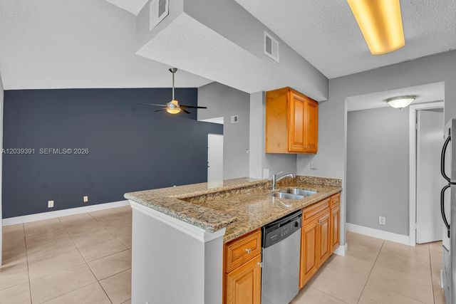 5740 Rock Island Road 299, Tamarac, FL 33319