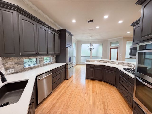 1309 Winding Brook Drive, Garland, TX 75044