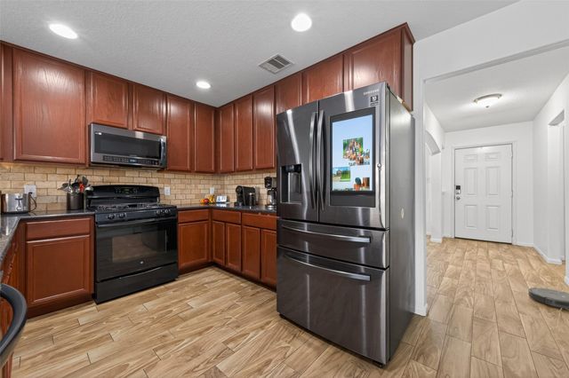 9931 Chimney Swift Lane, Conroe, TX 77385