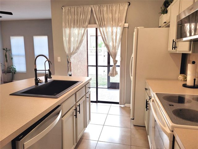 1018 TULLAMORE DRIVE, Wesley Chapel, FL 33543