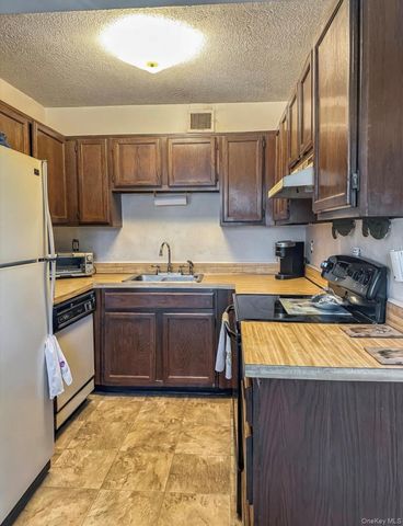 135 Fieldstone Court, Middle Island, NY 11953