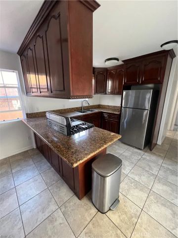 123 W 66th, Los Angeles, CA 90003