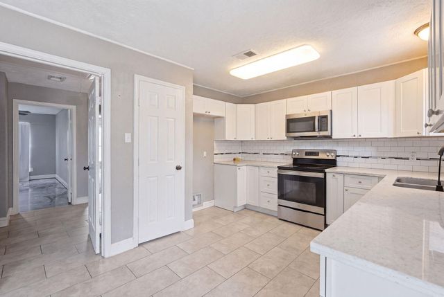 13286 Lake Breeze Lane, Willis, TX 77318