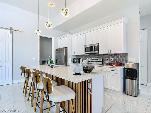 427 NW 7th AVE, Cape Coral, FL 33993