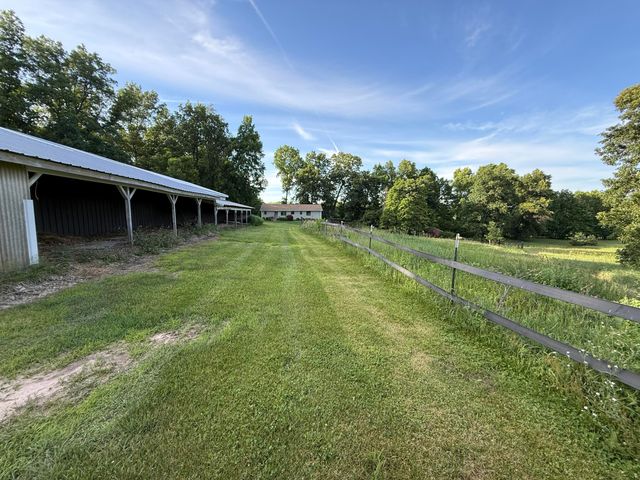 11229 W Snows Lake Road, Greenville, MI 48838