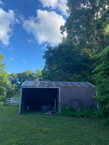 11229 W Snows Lake Road, Greenville, MI 48838