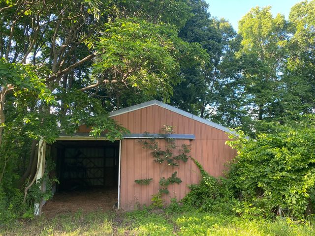 11229 W Snows Lake Road, Greenville, MI 48838