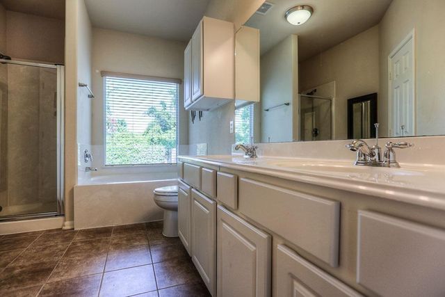 66 W Spindle Tree Circle, The Woodlands, TX 77382