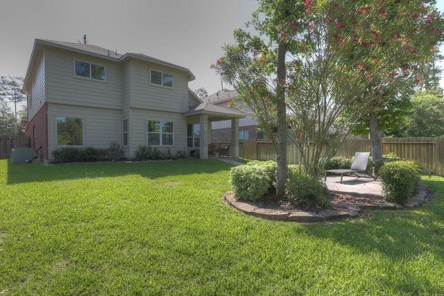 66 W Spindle Tree Circle, The Woodlands, TX 77382