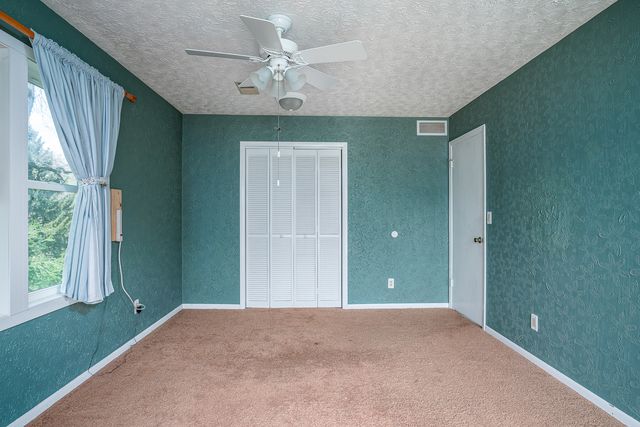 9 Valley View Drive, Blue Grass, IA 52726