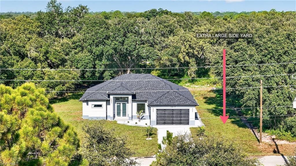 1817 Moore AVE, LEHIGH ACRES, FL 33972 — exterior