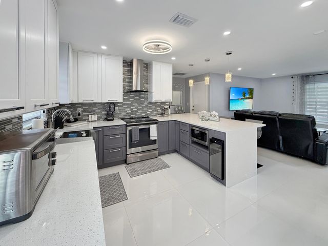 110 Bobwhite Road, Royal Palm Beach, FL 33411