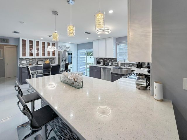 110 Bobwhite Road, Royal Palm Beach, FL 33411