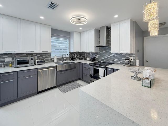 110 Bobwhite Road, Royal Palm Beach, FL 33411