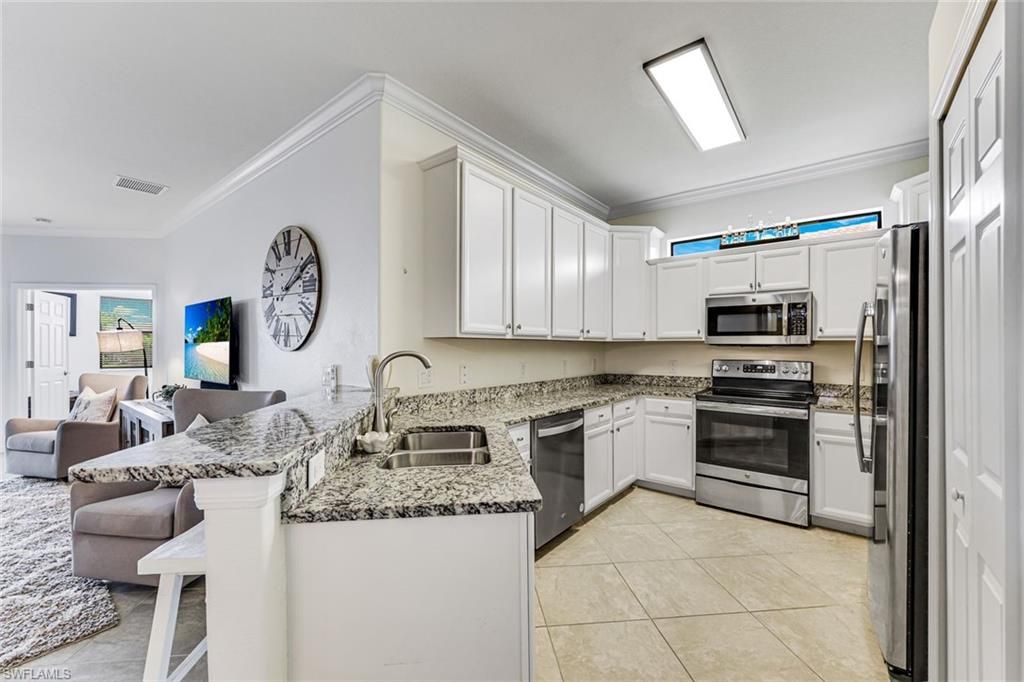 1427 Oceania DR S, NAPLES, FL 34113 — photo 4