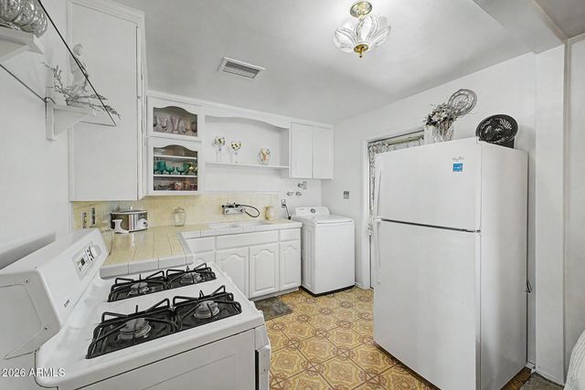 3703 W LEWIS Avenue, Phoenix, AZ 85009