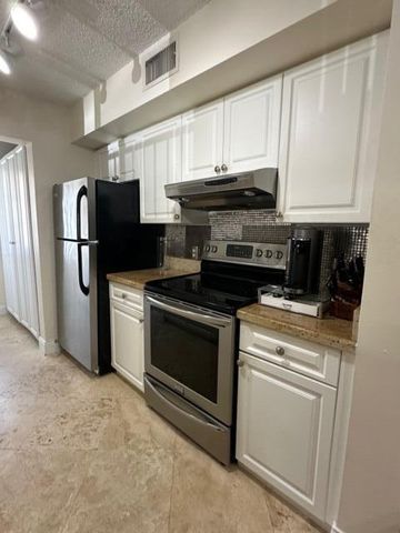 160 Yacht Club Way 212, Hypoluxo, FL 33462