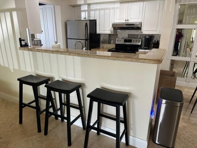 160 Yacht Club Way 212, Hypoluxo, FL 33462