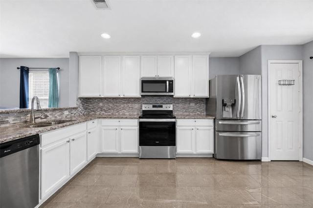 16454 Peyton Stone Circle, Houston, TX 77049