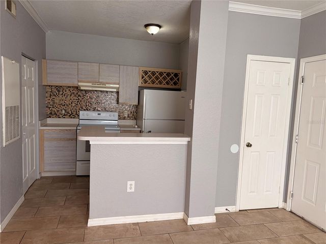 2674 ROBERT TRENT JONES DRIVE 323, Orlando, FL 32835