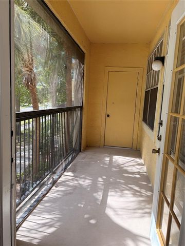 2674 ROBERT TRENT JONES DRIVE 323, Orlando, FL 32835