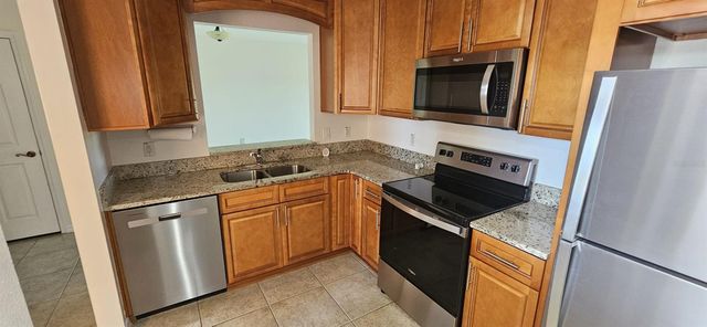 495 LAS CORTES LANE 205, Orlando, FL 32824