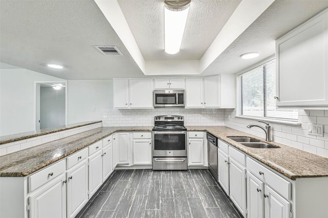 5222 Creek Shadows Drive, Houston, TX 77339