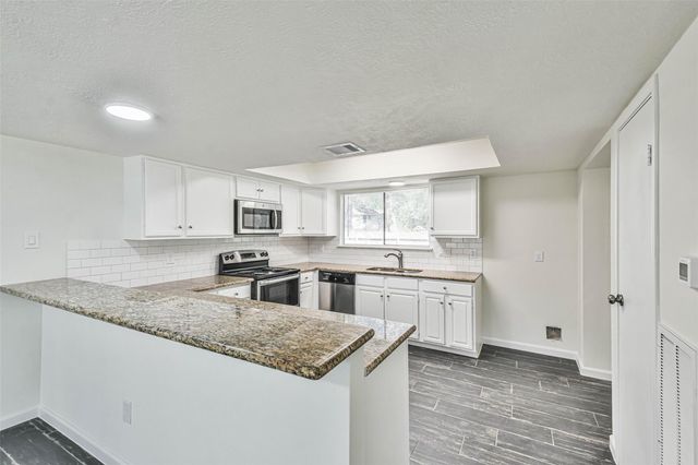 5222 Creek Shadows Drive, Houston, TX 77339