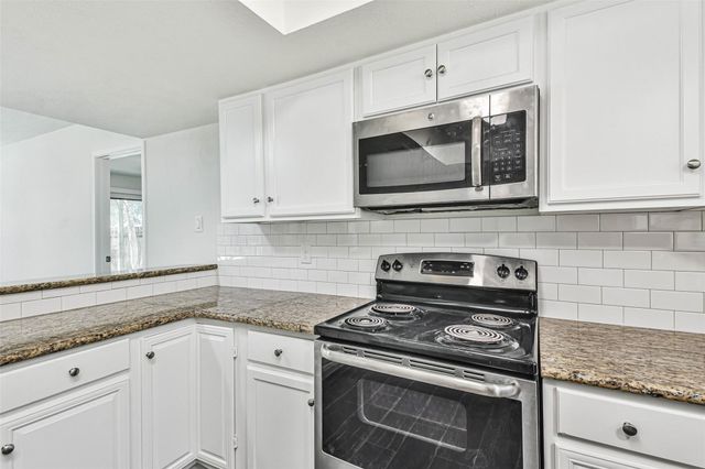 5222 Creek Shadows Drive, Houston, TX 77339