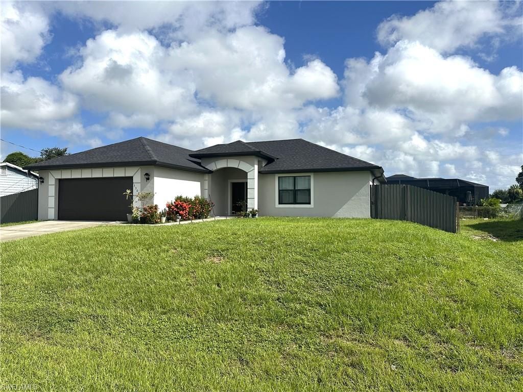 3308 37th ST SW, LEHIGH ACRES, FL 33976 — photo 2