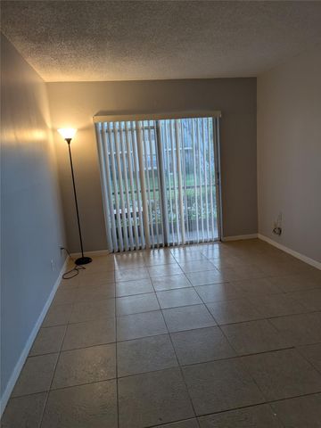 4138 NW 88th Avenue 104, Coral Springs, FL 33065